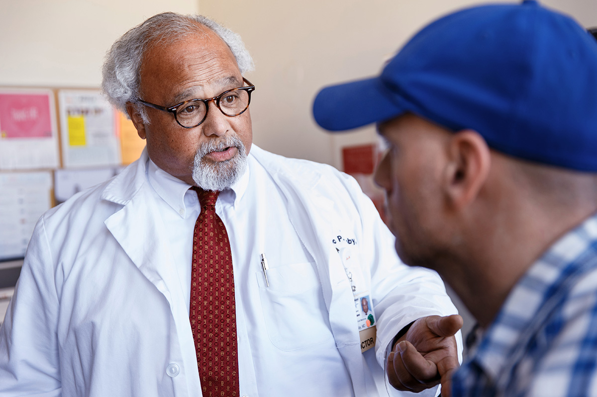 A doctor talking to a patient