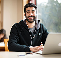A man smiling at the camera. Links to Beneficiary Designations